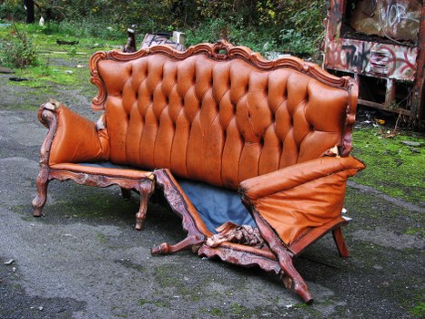 Manager reviewing complaint files for escalation