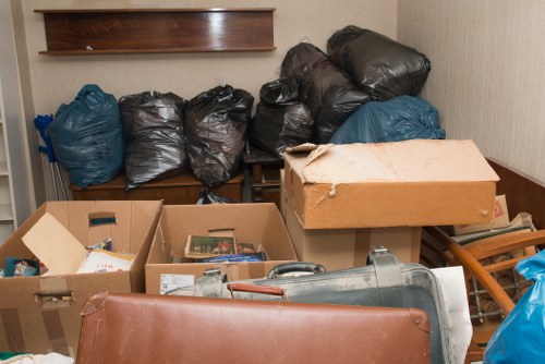 Eco-friendly disposal of items during loft clearance in Kensington